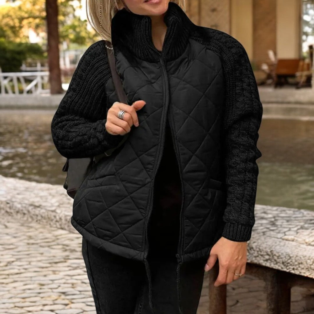 Steppjacke mit Strickärmeln und hohem Kragen