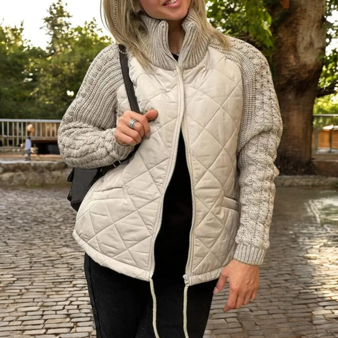 Steppjacke mit Strickärmeln und hohem Kragen