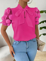 Elegante Bluse mit Schleifendetail und 3D-Tüllärmeln