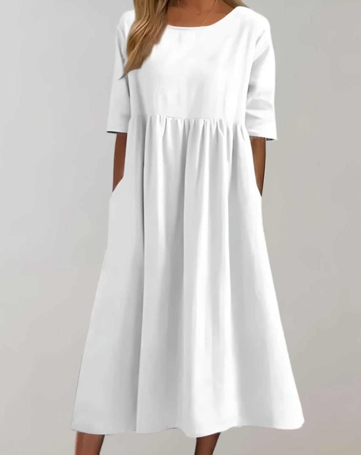Leichtes Sommerkleid mit Taschen und raffinierter Taille