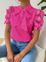 Elegante Bluse mit Schleifendetail und 3D-Tüllärmeln