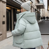 Manteau d'Hiver Imperméable Femme avec Doublure en Duvet et Capuche