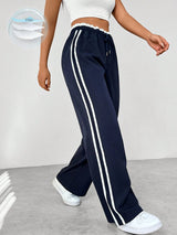 Damen Jogginghose – Weite Hose mit doppelten Seitenstreifen
