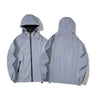 Unisex Windjacke – Leichte Jacke mit Kapuze und Reißverschlusstaschen