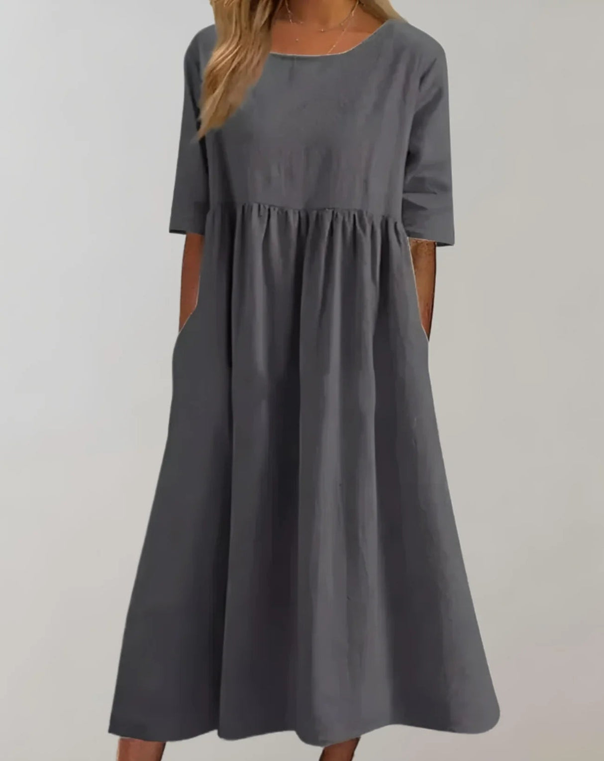 Leichtes Sommerkleid mit Taschen und raffinierter Taille