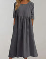 Leichtes Sommerkleid mit Taschen und raffinierter Taille