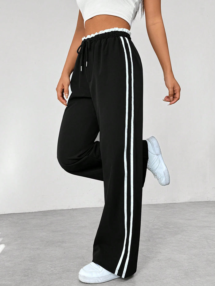 Damen Jogginghose – Weite Hose mit doppelten Seitenstreifen