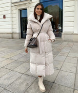 Langer Wintermantel für Damen – Eleganter gesteppter Mantel mit Gürtel