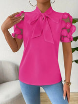 Elegante Bluse mit Schleifendetail und 3D-Tüllärmeln