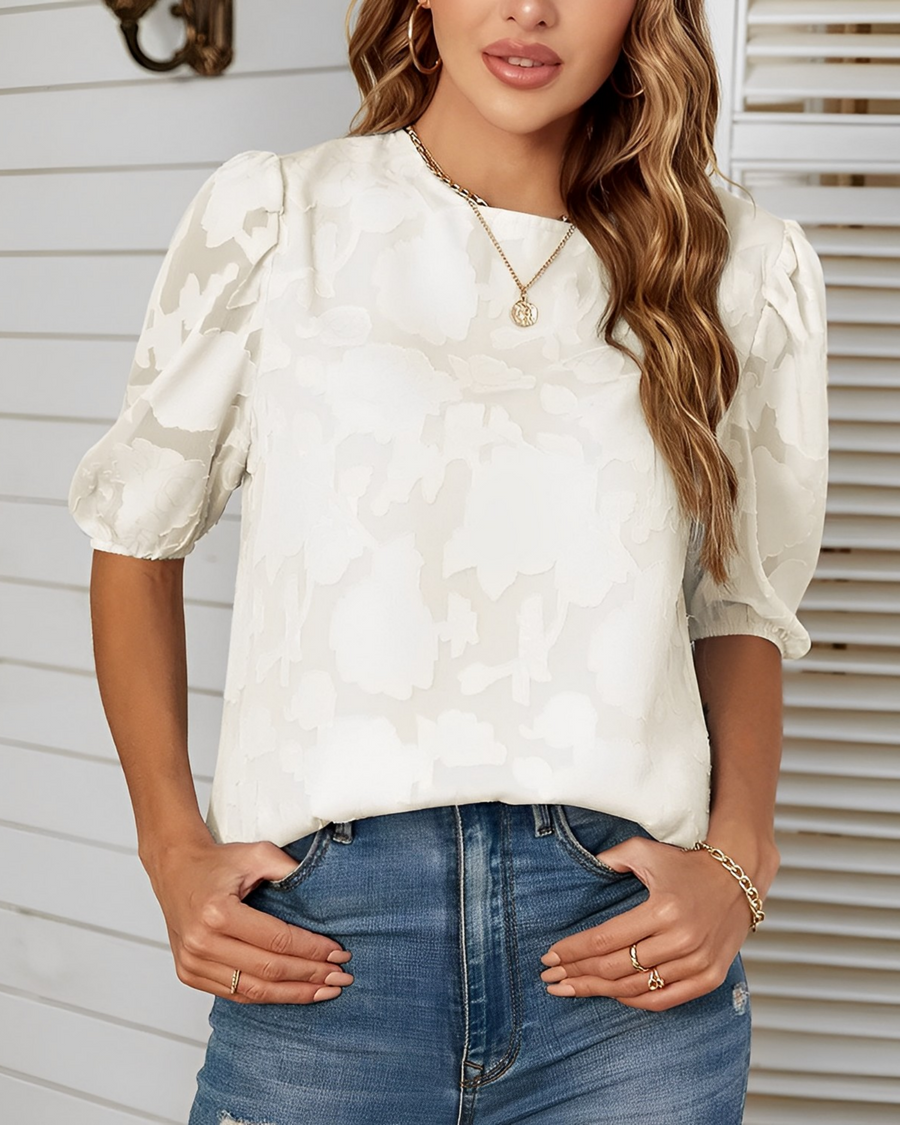 Blouse with puff sleeves and white floral pattern