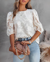 Blouse with puff sleeves and white floral pattern