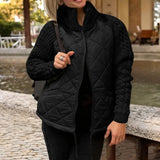Steppjacke mit Strickärmeln und hohem Kragen