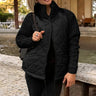 Steppjacke mit Strickärmeln und hohem Kragen