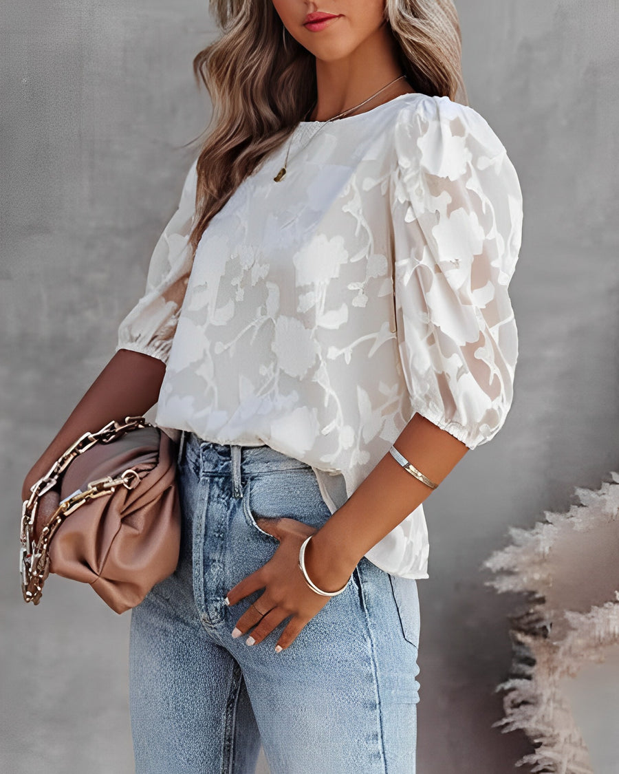 Blouse with puff sleeves and white floral pattern