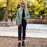 Steppjacke mit Strickärmeln und hohem Kragen