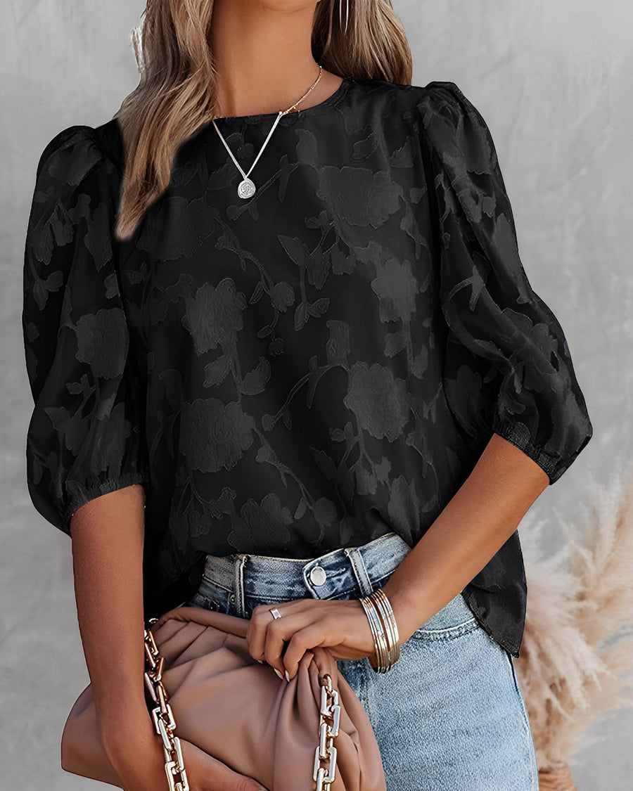 Blouse with puff sleeves and white floral pattern