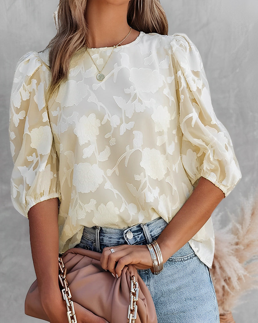 Blouse with puff sleeves and white floral pattern