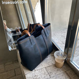 Elegante Ledertasche mit geräumigem Innenraum und mehreren Taschen