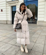 Langer Wintermantel für Damen – Eleganter gesteppter Mantel mit Gürtel