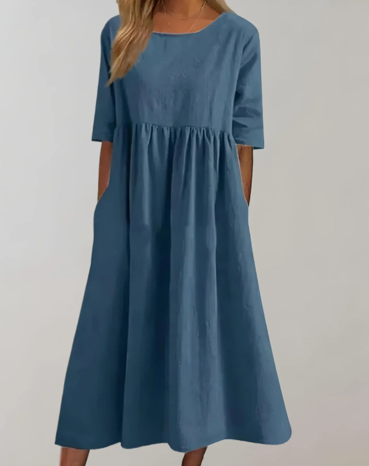 Leichtes Sommerkleid mit Taschen und raffinierter Taille