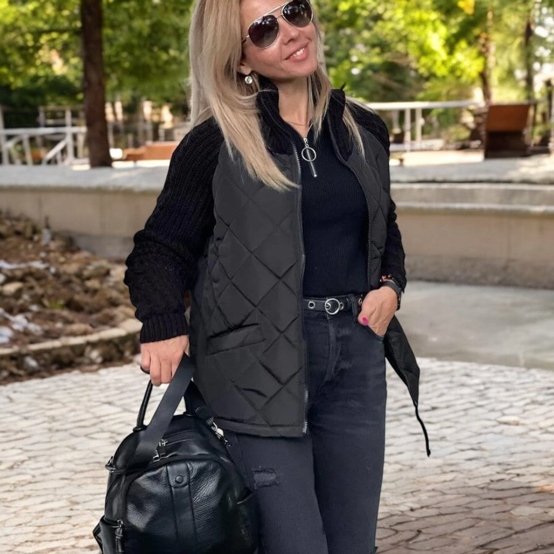 Steppjacke mit Strickärmeln und hohem Kragen