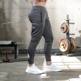 Herren-Jogginghose – Tarn-Sporthose mit Reißverschlusstaschen und Kordelzug