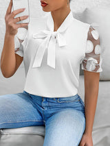 Elegante Bluse mit Schleifendetail und 3D-Tüllärmeln
